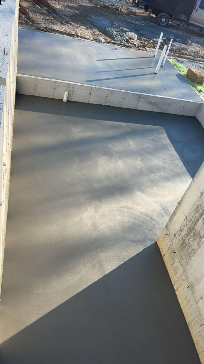 CW Concrete - freshly poured foundation with smooth finish