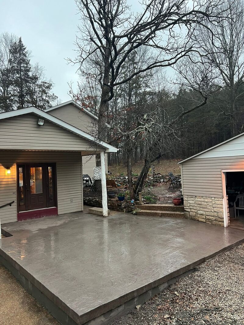 CW Concrete - completed concrete patio between house and garage
